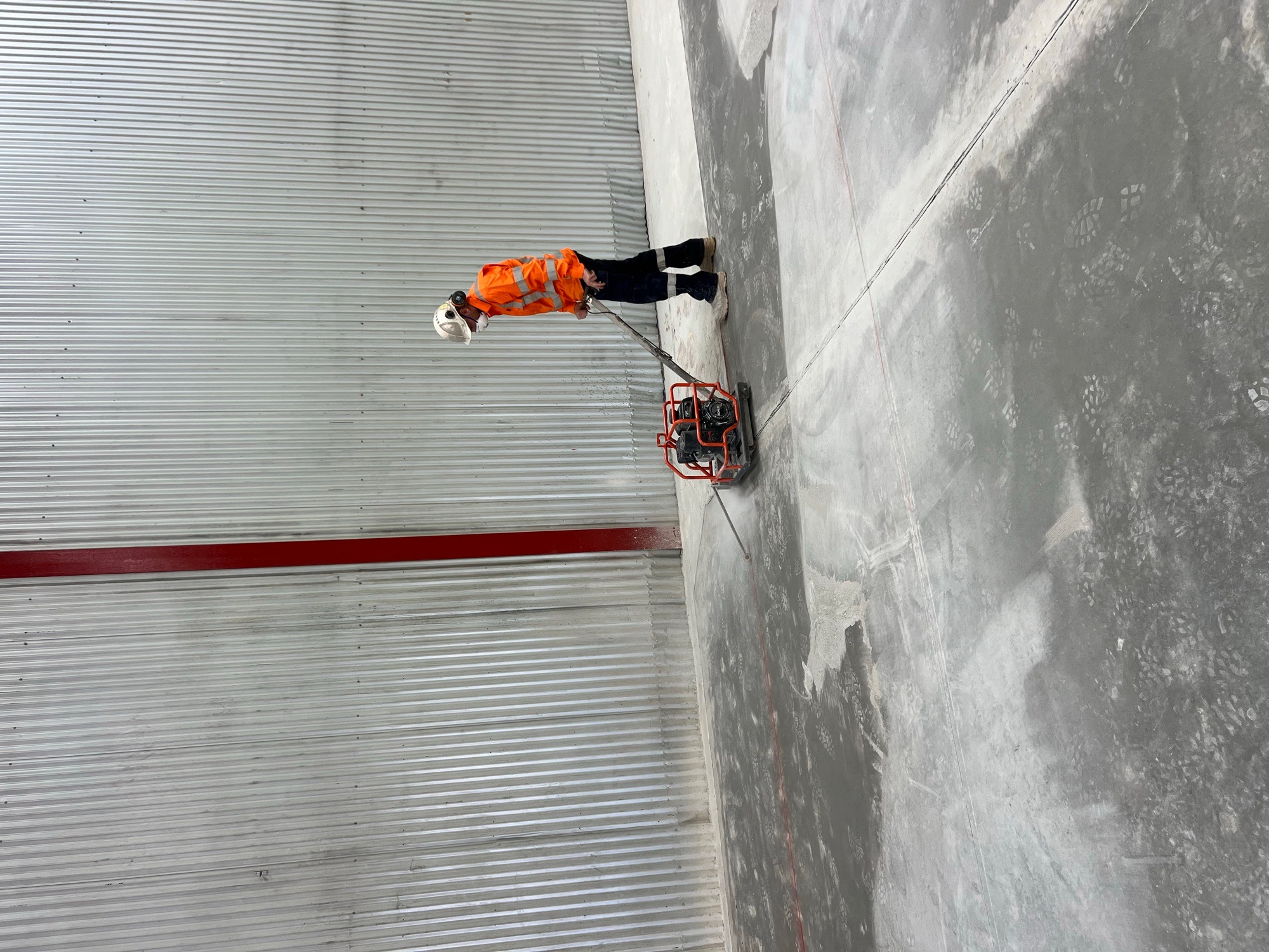ALL CORE operator soff-cutting control joints in the replacement warehouse slab